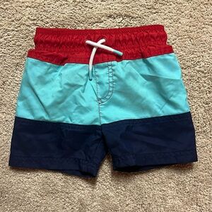 Carters boys 2T swim trunks. Red, teal and blue. Super cute